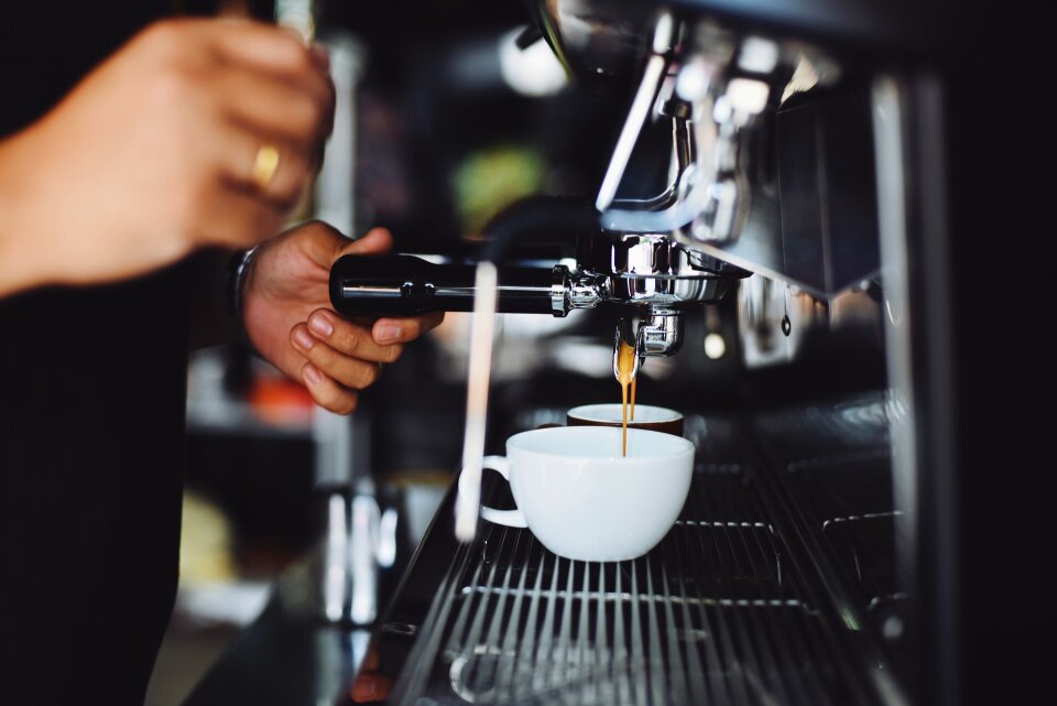 Close-up of espresso pouring from coffee machine