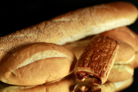 Fresh bread on wooden table