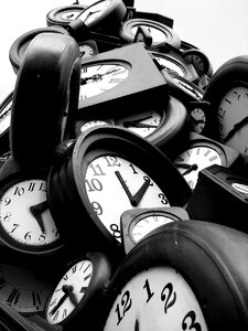 many clock on a gray background photo