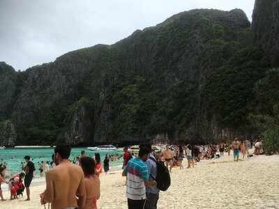 Tourists on white sand beach at Tachai island,Thailand