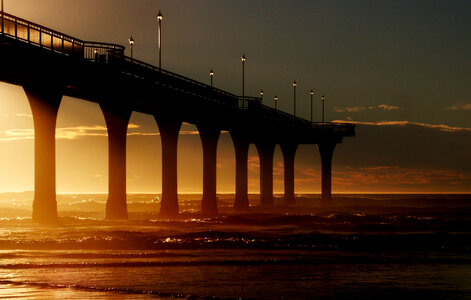 Dawn at the pier on the sea side in New Brighton, New Zealand