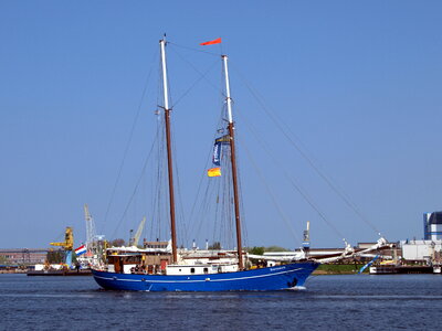 Blue sail yacht sailing
