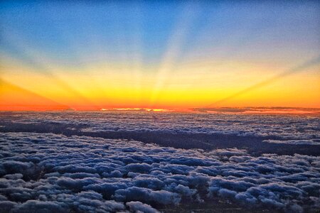 Sunrise in the clouds photo