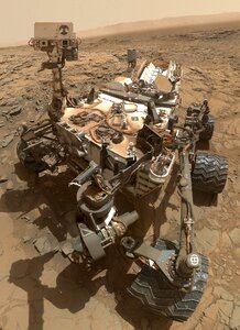 Curiosity rover exploring the surface of Mars photo