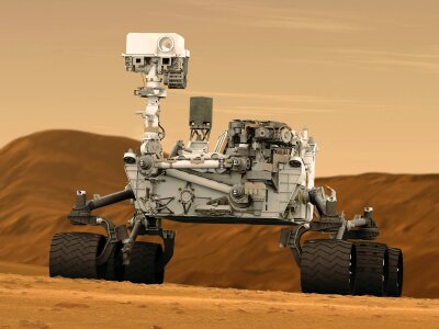 Curiosity rover exploring the surface of Mars photo