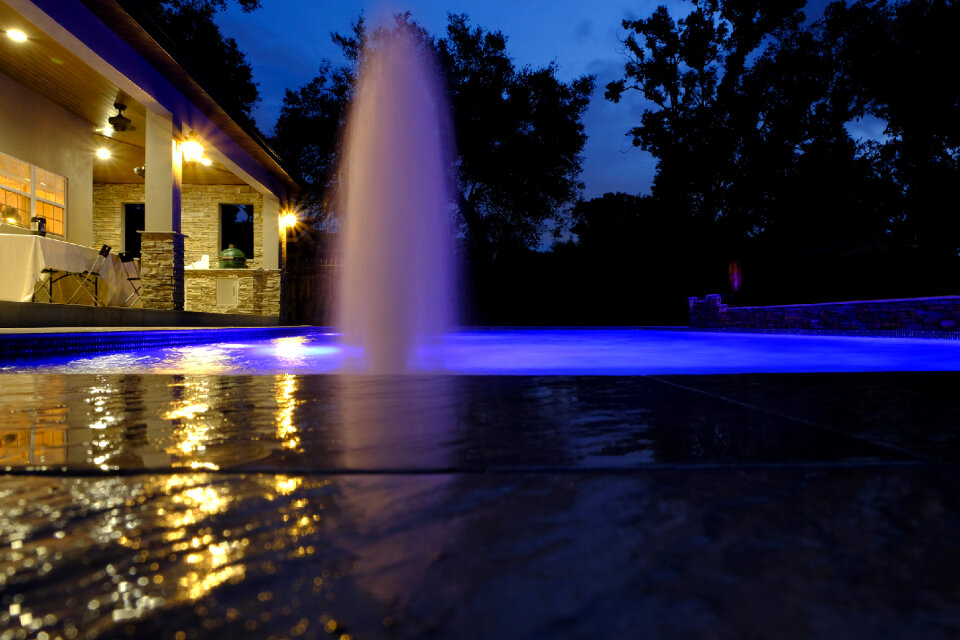 Pool and garden by night