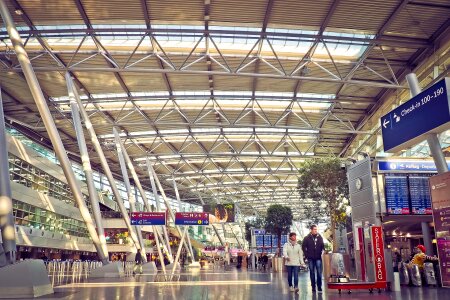 Passengers in an airport photo