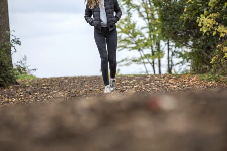 young woman hiker hiking in beautiful mountains