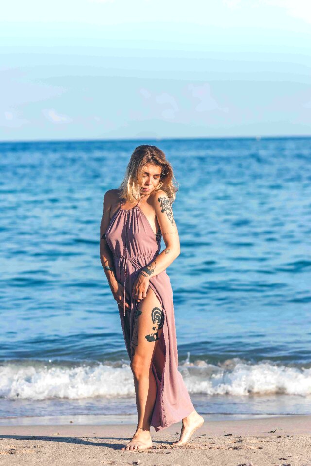 Sexy young woman on the beach