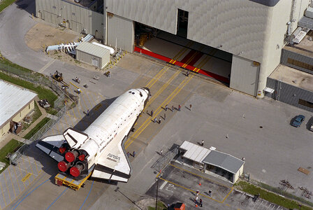 Carried atop an orbiter transporter,