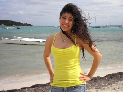 Young Latin woman in front of the sea photo
