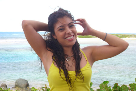 Young Latin woman in front of the sea photo