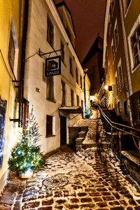 Street in a Christmas night in an old European town photo