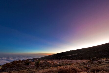 Mount Kilimanjaro and clouds line at sunset photo