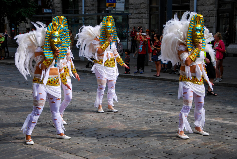Unknown woman dancing samba on the street