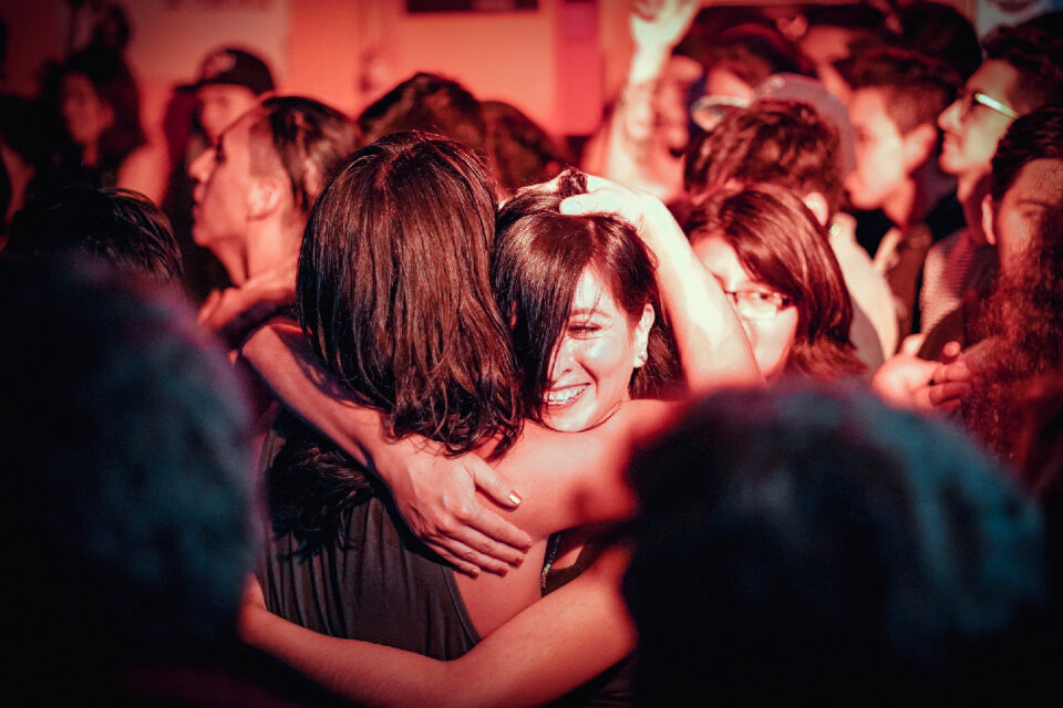 Young people dancing in night club