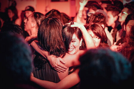 Young people dancing in night club