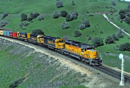 Diesel electric locomotives drag their train up photo