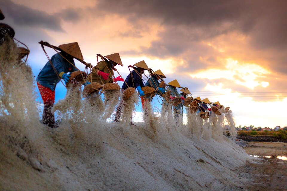 People working on salt field in Nha Trang, Southern Vietnam