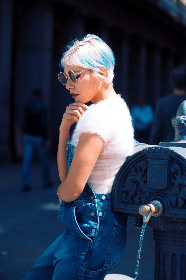 Beautiful young woman walking on the street