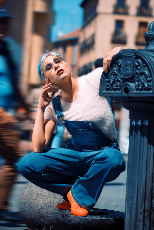 Beautiful young woman walking on the street