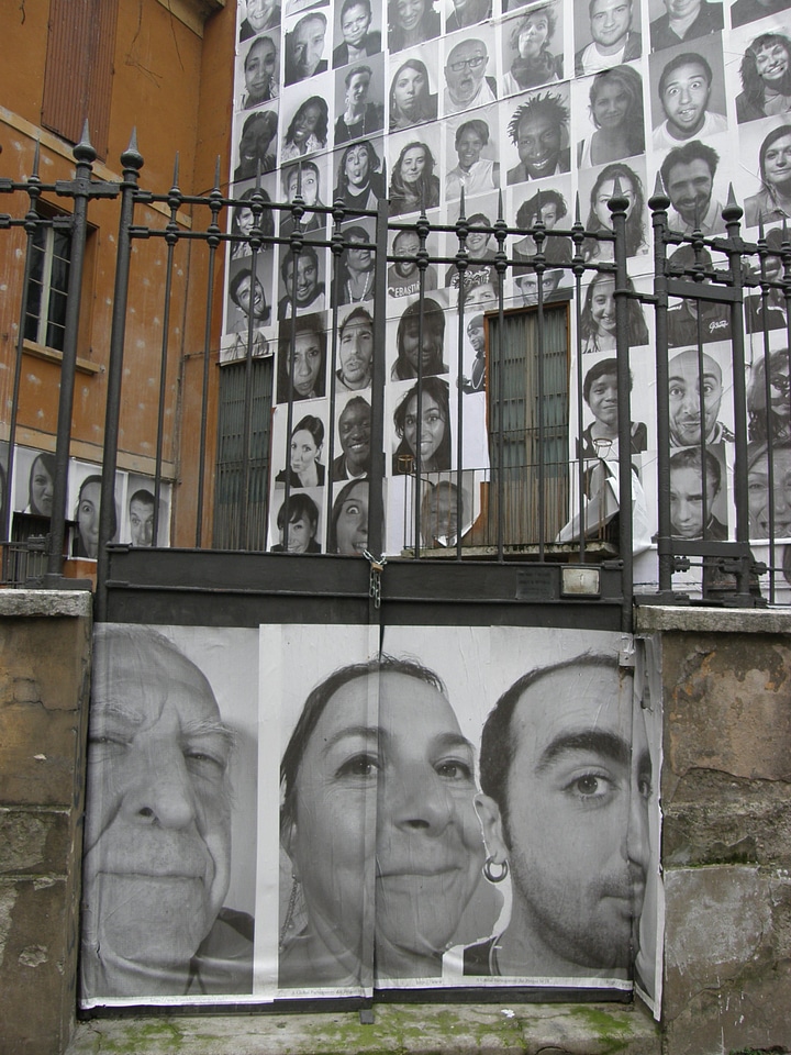 Wall with faces manifesto art