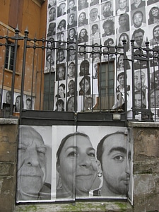 Wall with faces manifesto art
