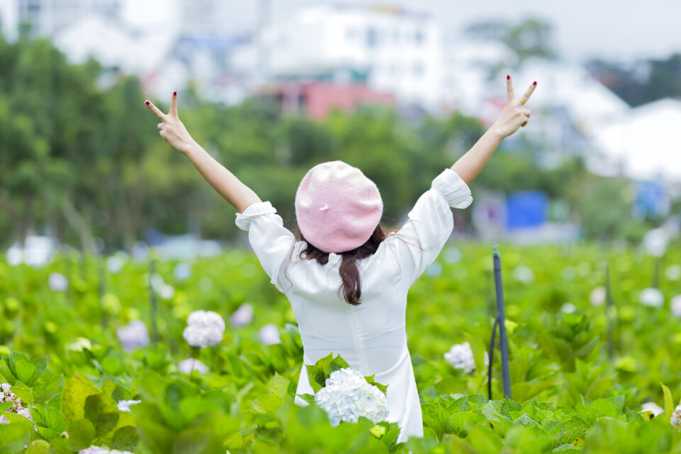 Beautiful Asian Girl smell of the flower photo