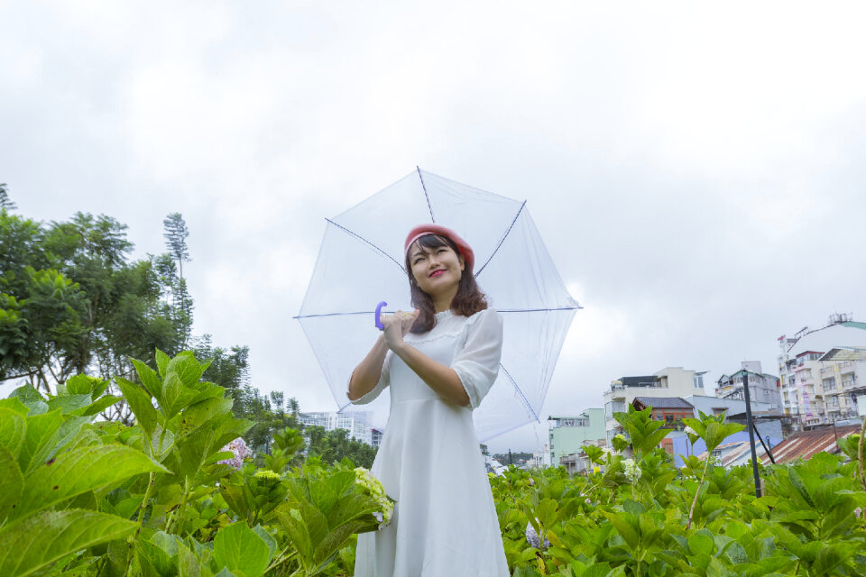 Beautiful Asian Girl smell of the flower photo