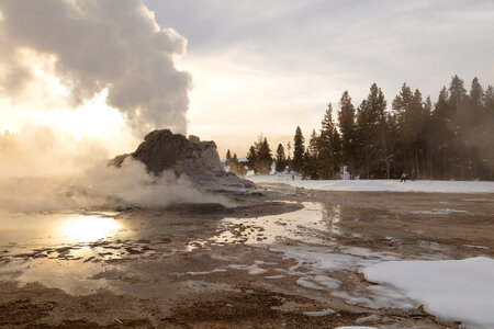 Skiers near Castle Geyser
