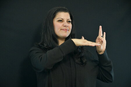 Woman learns sign language photo