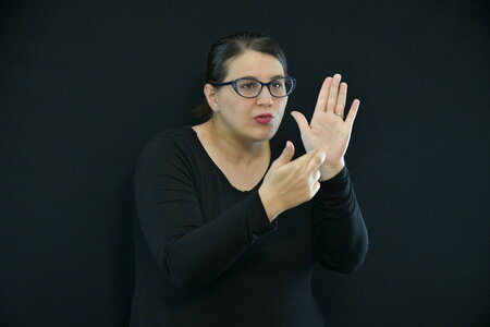 Woman learns sign language photo