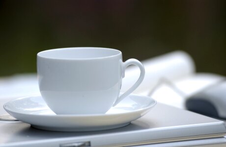 cup of coffee on the table photo