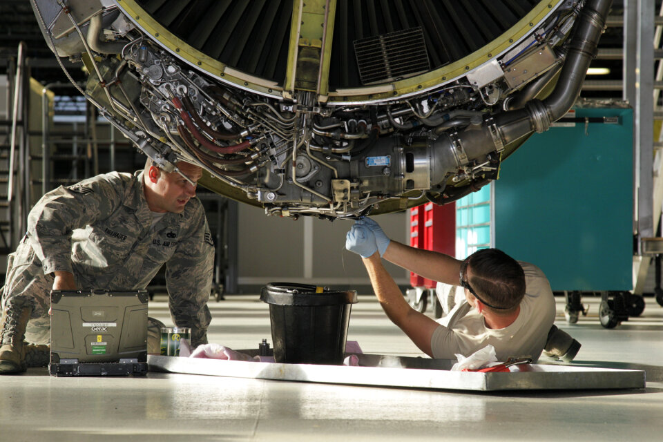 Service the Engine of a KC-135 Stratotanker