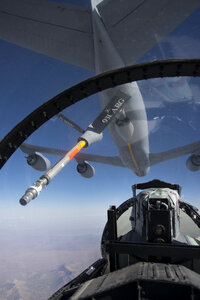 F-15D aircraft away from a KC-135 refueling tanker
