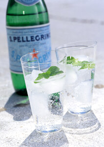 Fresh sparkle drink with lime and mint photo
