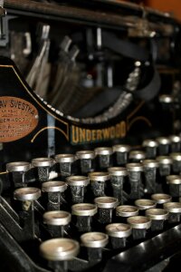 Close up photo of antique typewriter keys, shallow focus photo