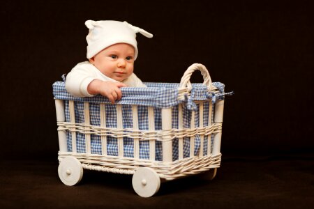 Baby standing up in crib photo