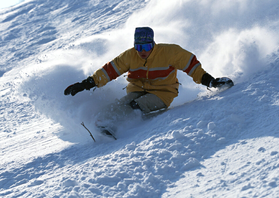 Snowboarder in action at the mountains