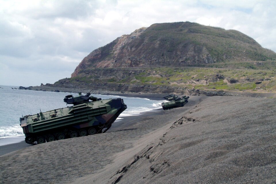 Amphibious Assault Vehicles line the beach