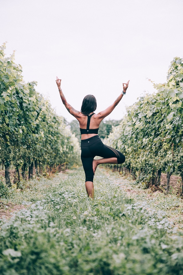 Woman Doing Tree Pose photo