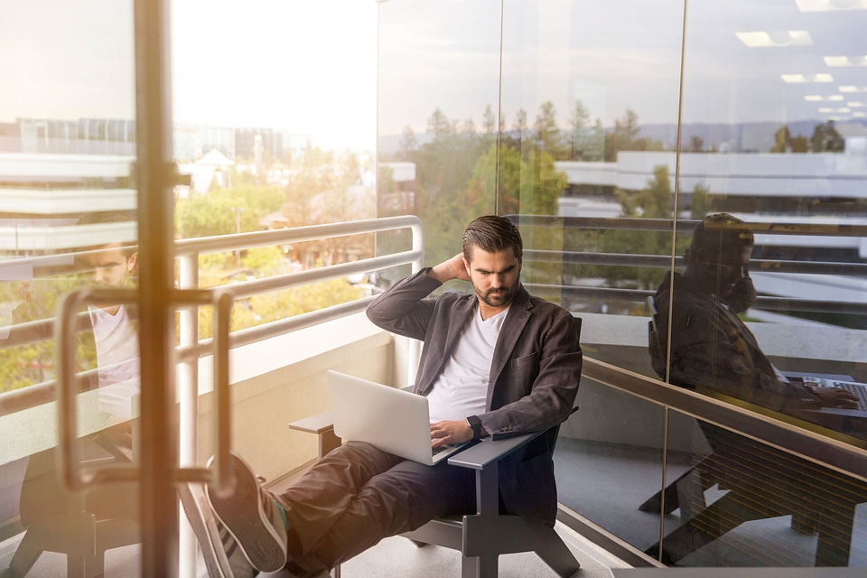 Man Sitting Outside Laptop photo