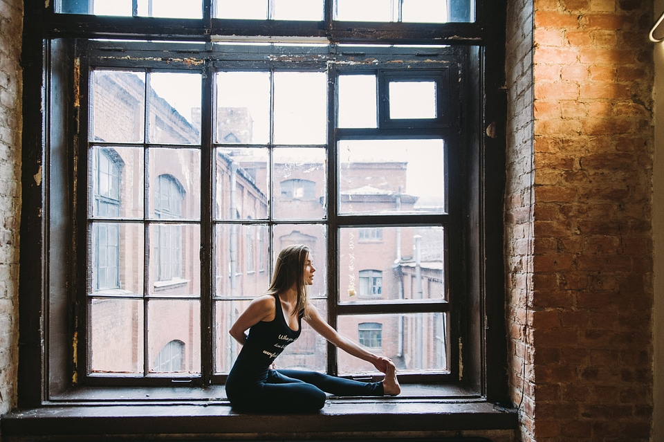 Woman Exercise Window Yoga photo