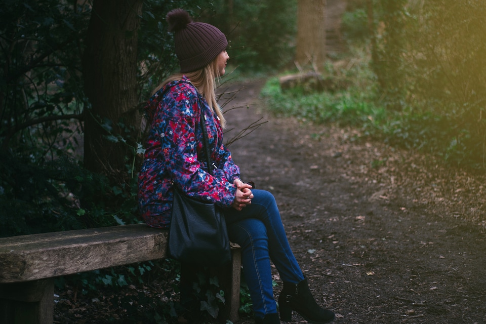 Woman Sitting Bench photo