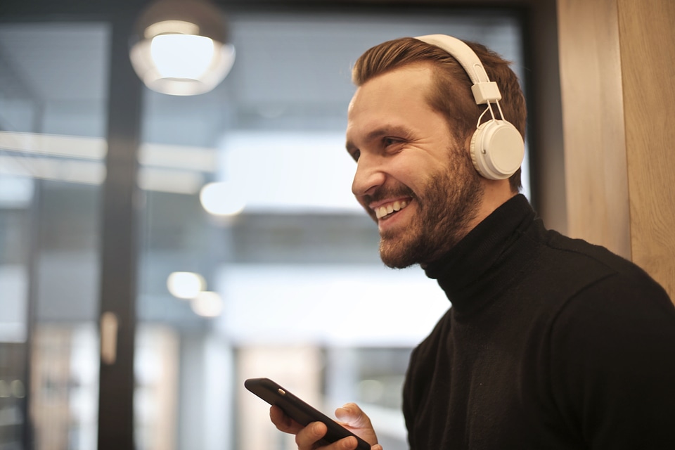 Handsome Man Listening Music Headphones photo