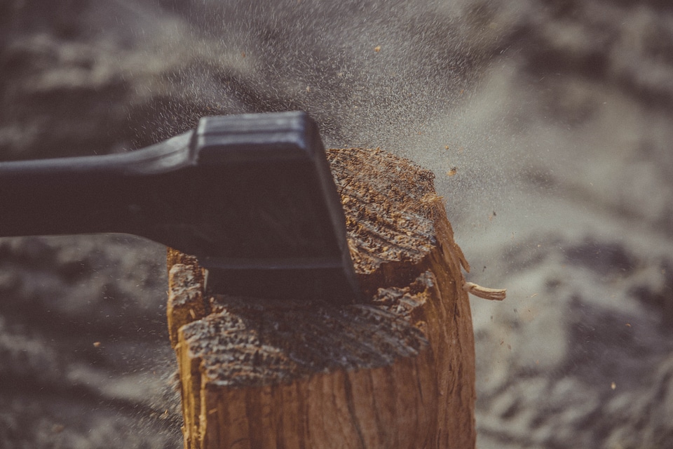 Axe Chopping Log Wood