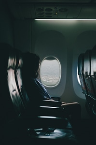 Woman Plane Window photo