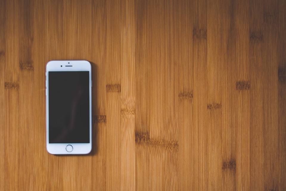 White iPhone Wood Desk photo