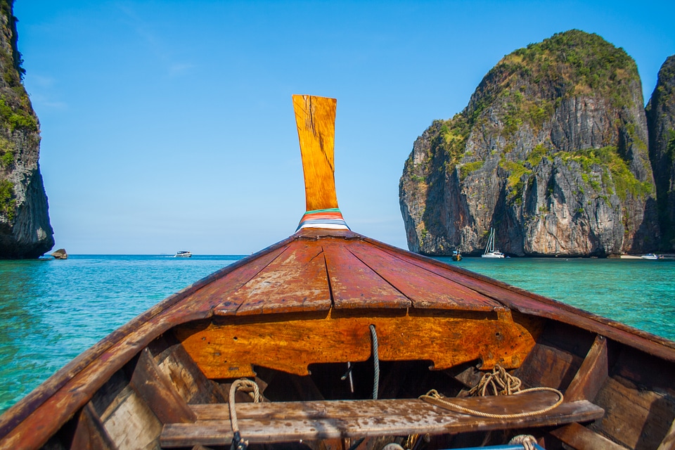 Rustic Row Boat on Clear Water