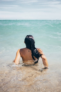 Woman Swims In Ocean photo